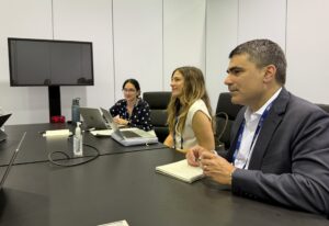 Hetal Vig, Mary McGillicuddy, and Jim Palma meeting with partners at the 2026 ASCO Annual Meeting.
